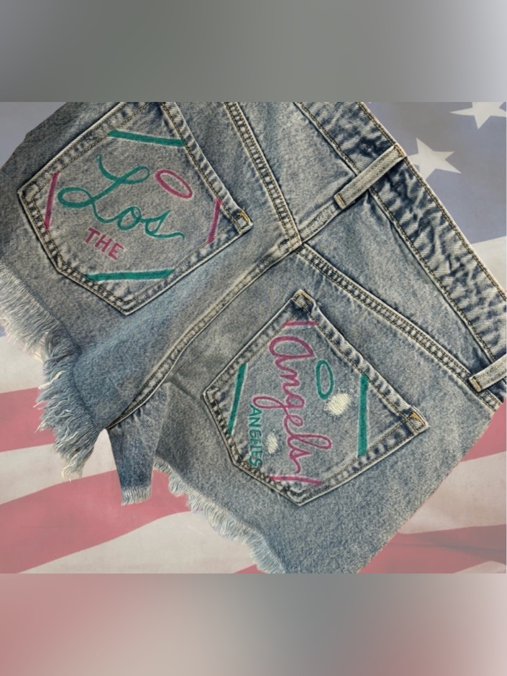 One of a Kind Jean Shorts w/ Hand-painted designs by artist - Picture 3 of 9